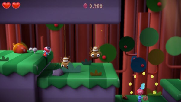 Auf dem Screenshot wird Ayo an der Kante zu einem Feld mit zwei Gegnern gezeigt. Es handelt sich bei den Gegnern um Spinnen, die sich immer wieder abseilen.