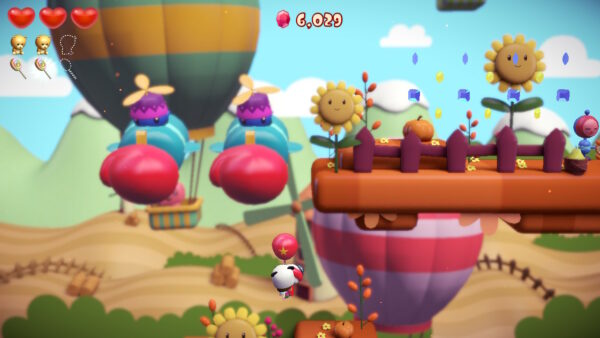 Der Screenshot aus Ayo the Clown zeigt ein Level, in dem Ayo ständig nach oben fliegen muss.