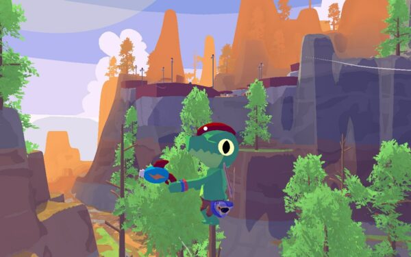 Ein kleiner grüner Alligator mit einer roten Baskenmütze klettert auf der Spitze eines Tannenbaumes. Im Hintergrund sind weitere Bäume und ein paar Berge erkennbar.