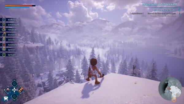 Spielfigur blickt von einem Berg auf eine verschneite Spielwelt.